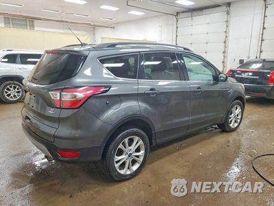 Trzecie zdjęcie samochodu z tyłu: 2017 FORD ESCAPE SE VIN:1FMCU9GD1HUC09763 - miniatura