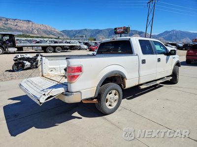 Trzecie zdjęcie samochodu z tyłu: 2014 FORD F150 SUPERCREW VIN:1FTFW1EF5EKD48674 - miniatura