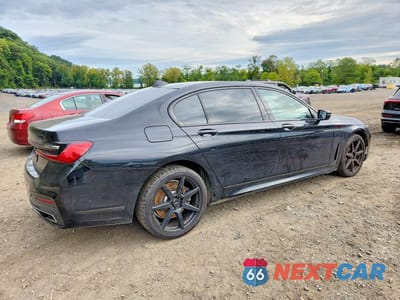 Trzecie zdjęcie samochodu z tyłu: 2020 BMW 750 XI VIN:WBA7U2C0XLGJ59675 - miniatura