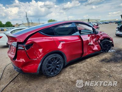 Trzecie zdjęcie samochodu z tyłu: 2022 TESLA MODEL Y VIN:7SAYGDEE3NF481447 - miniatura