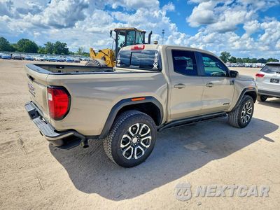 Trzecie zdjęcie samochodu z tyłu: 2024 GMC CANYON AT4 VIN:1GTP6DEK7R1148376 - miniatura