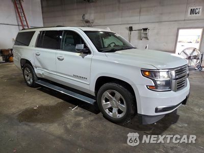 Czwarte zdjęcie samochodu z boku: 2016 CHEVROLET SUBURBAN K1500 LTZ VIN:1GNSKJKC7GR122741 - miniatura