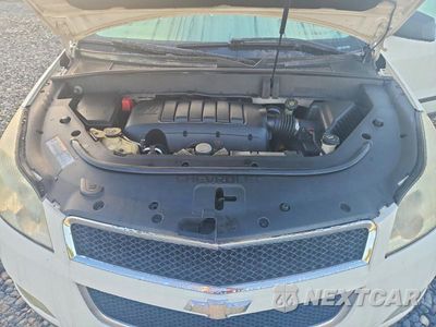 Zdjęcie 12 z 13 samochodu: 2012 CHEVROLET TRAVERSE LS VIN:1GNKREED0CJ176088 - miniatura