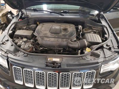 Zdjęcie 12 z 13 samochodu: 2016 JEEP GRAND CHEROKEE SUMMIT VIN:1C4RJFJG4GC378866 - miniatura