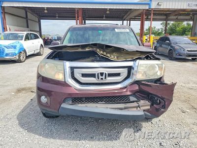 Piąte zdjęcie samochodu w środku: 2011 HONDA PILOT EX VIN:5FNYF3H42BB047657 - miniatura