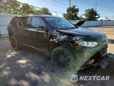 Czwarte zdjęcie samochodu z boku: 2018 CHEVROLET TRAVERSE PREMIER VIN:1GNERKKW5JJ164355 - miniatura
