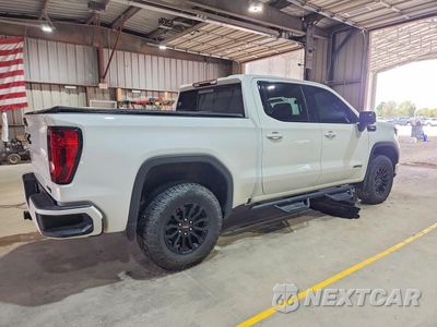 Trzecie zdjęcie samochodu z tyłu: 2022 GMC SIERRA K1500 AT4 VIN:1GTUUEET4NZ521974 - miniatura