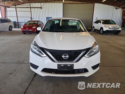 Piąte zdjęcie samochodu w środku: 2018 NISSAN SENTRA S VIN:3N1AB7AP4JY243758 - miniatura