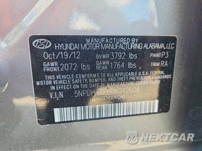 Zdjęcie 12 z 12 samochodu: 2013 HYUNDAI ELANTRA GLS VIN:5NPDH4AE6DH242604 - miniatura