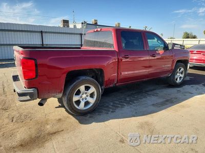 Trzecie zdjęcie samochodu z tyłu: 2018 CHEVROLET SILVERADO C1500 LT VIN:3GCPCREC1JG473237 - miniatura