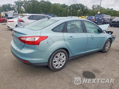 Trzecie zdjęcie samochodu z tyłu: 2012 FORD FOCUS SE VIN:1FAHP3F27CL460788 - miniatura