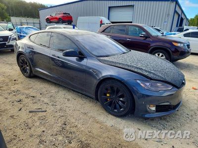 Czwarte zdjęcie samochodu z boku: 2015 TESLA MODEL S 85D VIN:5YJSA1H29FF100934 - miniatura