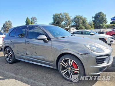 Czwarte zdjęcie samochodu z boku: 2013 PORSCHE CAYENNE GTS VIN:WP1AD2A28DLA79926 - miniatura