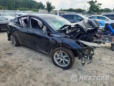 Czwarte zdjęcie samochodu z boku: 2023 TESLA MODEL Y VIN:7SAYGDEE7PA082962 - miniatura