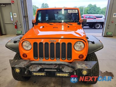 Piąte zdjęcie samochodu w środku: 2013 JEEP WRANGLER UNLIMITED SPORT VIN:1C4BJWDG5DL520120 - miniatura