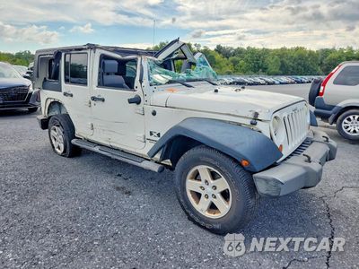 Czwarte zdjęcie samochodu z boku: 2009 JEEP WRANGLER UNLIMITED X VIN:1J4GA39149L766750 - miniatura