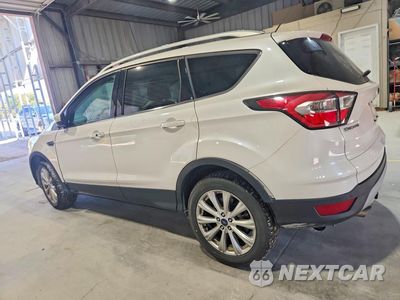 Drugie zdjęcie samochodu z przodu: 2017 FORD ESCAPE TITANIUM VIN:1FMCU0J99HUA81479 - miniatura