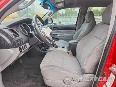 Zdjęcie 7 z 12 samochodu: 2013 TOYOTA TACOMA V6 VIN:3TMLU4EN7DM107174 - miniatura