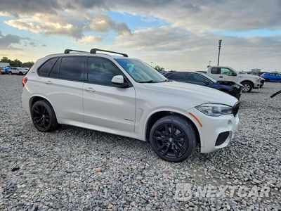 Czwarte zdjęcie samochodu z boku: 2018 BMW X5 XDR40E VIN:5UXKT0C5XJ0W02329 - miniatura
