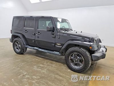 Czwarte zdjęcie samochodu z boku: 2013 JEEP WRANGLER UNLIMITED SAHARA VIN:1C4BJWEG7DL655792 - miniatura