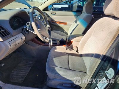 Zdjęcie 7 z 13 samochodu: 2002 TOYOTA CAMRY XLE VIN:4T1BE30K12U631182 - miniatura