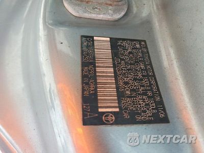 Zdjęcie 12 z 12 samochodu: 2007 TOYOTA YARIS BASE VIN:JTDJT923X75088916 - miniatura