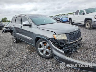 Czwarte zdjęcie samochodu z boku: 2013 JEEP GRAND CHEROKEE OVERLAND VIN:1C4RJECT2DC537917 - miniatura