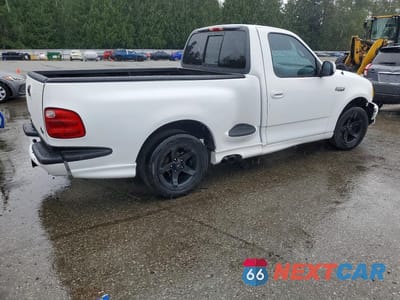 Trzecie zdjęcie samochodu z tyłu: 2000 FORD F150 SVT LIGHTNING VIN:2FTZF0738YCA82702 - miniatura