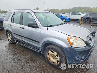 Czwarte zdjęcie samochodu z boku: 2006 HONDA CR-V LX VIN:JHLRD78576C042535 - miniatura
