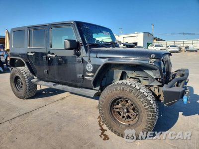 Czwarte zdjęcie samochodu z boku: 2009 JEEP WRANGLER UNLIMITED SAHARA VIN:1J4GA59149L760569 - miniatura
