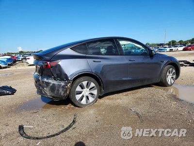 Trzecie zdjęcie samochodu z tyłu: 2023 TESLA MODEL Y VIN:7SAYGDEE1PF879520 - miniatura