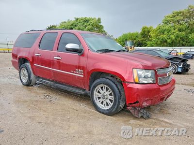 Czwarte zdjęcie samochodu z boku: 2011 CHEVROLET SUBURBAN C1500 LT VIN:1GNSCJE09BR270364 - miniatura