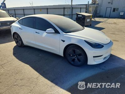 Czwarte zdjęcie samochodu z boku: 2021 TESLA MODEL 3 VIN:5YJ3E1EA0MF947732 - miniatura