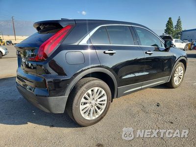 Trzecie zdjęcie samochodu z tyłu: 2024 CADILLAC XT4 LUXURY VIN:1GYAZAR46RF232399 - miniatura