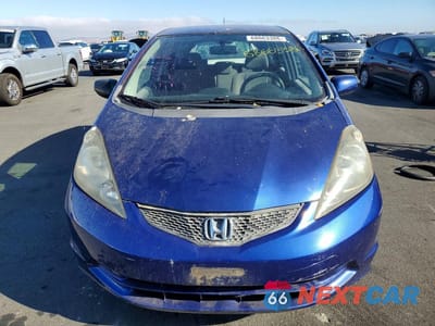 Piąte zdjęcie samochodu w środku: 2010 HONDA FIT VIN:JHMGE8G20AS016385 - miniatura