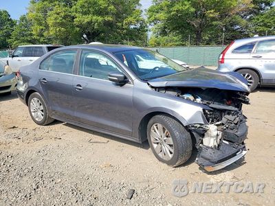 Czwarte zdjęcie samochodu z boku: 2015 VOLKSWAGEN JETTA SE VIN:3VWD17AJ7FM418220 - miniatura