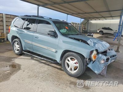 Czwarte zdjęcie samochodu z boku: 2002 GMC ENVOY VIN:1GKDT13S722371387 - miniatura