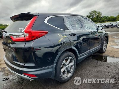 Trzecie zdjęcie samochodu z tyłu: 2018 HONDA CR-V EXL VIN:7FARW1H81JE016057 - miniatura