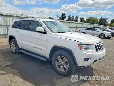 Czwarte zdjęcie samochodu z boku: 2014 JEEP GRAND CHEROKEE LAREDO VIN:1C4RJFAG8EC230782 - miniatura