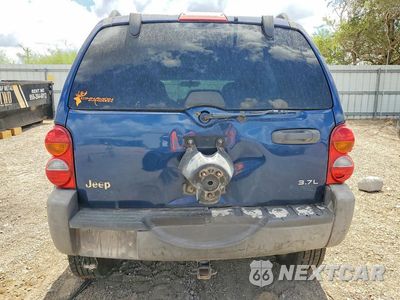 Zdjęcie 6 z 12 samochodu: 2004 JEEP LIBERTY SPORT VIN:1J4GK48K94W256074 - miniatura