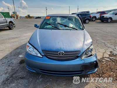 Piąte zdjęcie samochodu w środku: 2004 TOYOTA CAMRY LE VIN:4T1BE32K14U856914 - miniatura