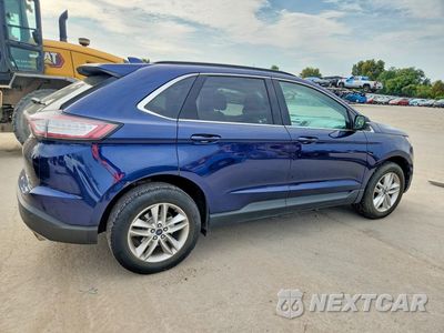 Trzecie zdjęcie samochodu z tyłu: 2016 FORD EDGE SEL VIN:2FMPK4J91GBC21205 - miniatura