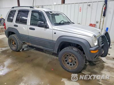 Czwarte zdjęcie samochodu z boku: 2003 JEEP LIBERTY SPORT VIN:1J4GL48K73W722225 - miniatura