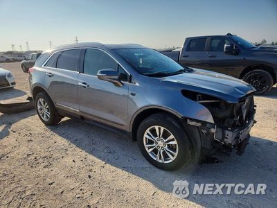 Czwarte zdjęcie samochodu z boku: 2020 CADILLAC XT5 PREMIUM LUXURY VIN:1GYKNDRS3LZ189159 - miniatura