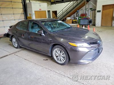 Czwarte zdjęcie samochodu z boku: 2018 TOYOTA CAMRY HYBRID XLE VIN:4T1B21HK0JU009687 - miniatura
