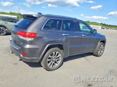 Trzecie zdjęcie samochodu z tyłu: 2018 JEEP GRAND CHEROKEE OVERLAND VIN:1C4RJFCG1JC169850 - miniatura