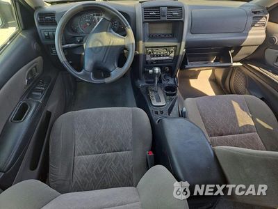 Zdjęcie 8 z 12 samochodu: 2003 ISUZU AXIOM XS VIN:4S2CE58X034601780 - miniatura