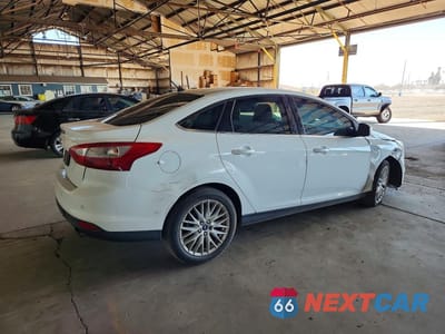 Trzecie zdjęcie samochodu z tyłu: 2014 FORD FOCUS TREND VIN:WF0HP4L20E4105430 - miniatura
