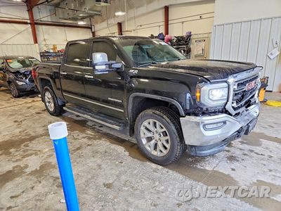 Czwarte zdjęcie samochodu z boku: 2017 GMC SIERRA K1500 SLT VIN:3GTU2NEJ0HG504971 - miniatura