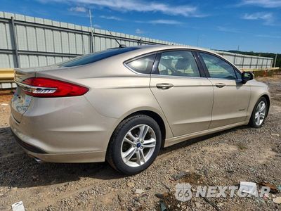 Trzecie zdjęcie samochodu z tyłu: 2018 FORD FUSION SE HYBRID VIN:3FA6P0LU4JR250479 - miniatura